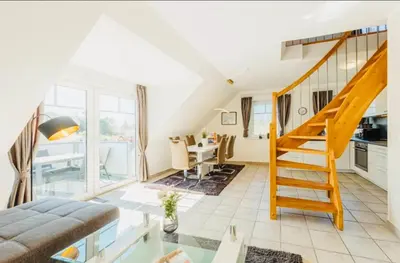 Ein Sitzbereich in der Unterkunft Darßer Weg 36a Whg 10 
