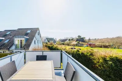 Ein Balkon oder eine Terrasse in der Unterkunft Darßer Weg 36a Whg 10 