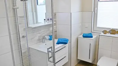 Ein Badezimmer in der Unterkunft Beachside Zingst - Exklusiv und Strandnah