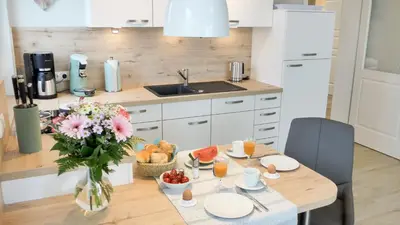 Küche/Küchenzeile in der Unterkunft Beachside Zingst - Exklusiv und Strandnah