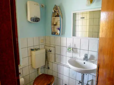 Ein Badezimmer in der Unterkunft Ferienhaus am Saaler Bodden