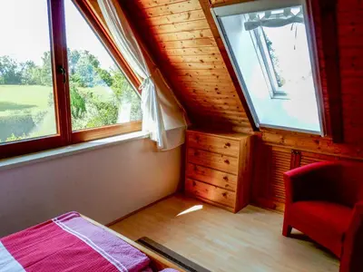 Ein Bett oder Betten in einem Zimmer der Unterkunft Ferienhaus am Saaler Bodden