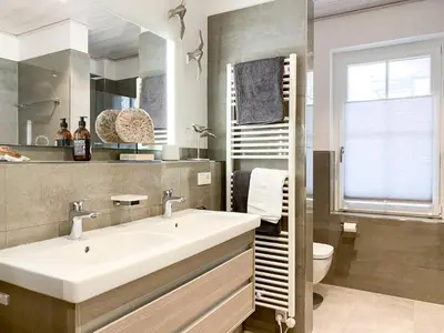 Ein Badezimmer in der Unterkunft Sonnenseite Panoramaliebe, App 21