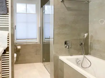 Ein Badezimmer in der Unterkunft Sonnenseite Panoramaliebe, App 21