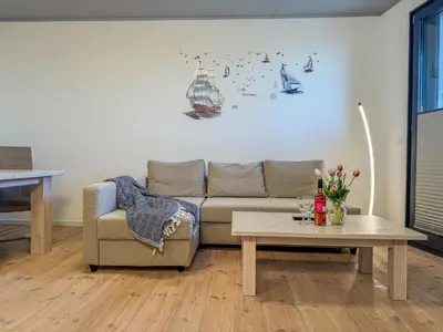 Ein Sitzbereich in der Unterkunft Speicherresidenz App 1 5 - Hafenblick