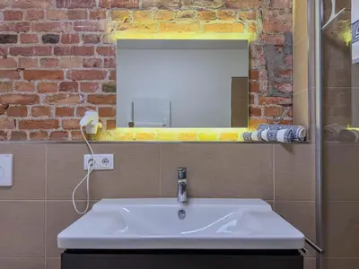 Ein Badezimmer in der Unterkunft Speicherresidenz App 1 5 - Hafenblick