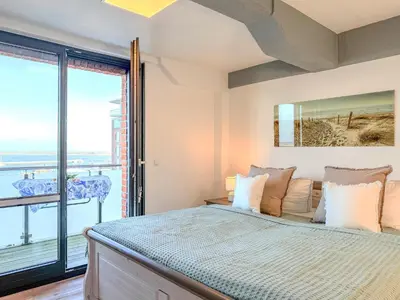 Ein Bett oder Betten in einem Zimmer der Unterkunft Speicherresidenz App 4 4 - Wasserblick