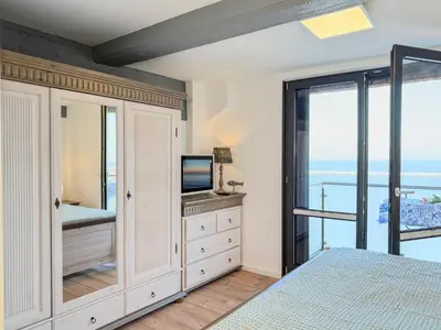 Ein Bett oder Betten in einem Zimmer der Unterkunft Speicherresidenz App 4 4 - Wasserblick