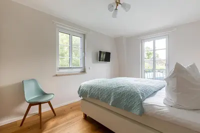 Ein Bett oder Betten in einem Zimmer der Unterkunft Ostseeschnäpel