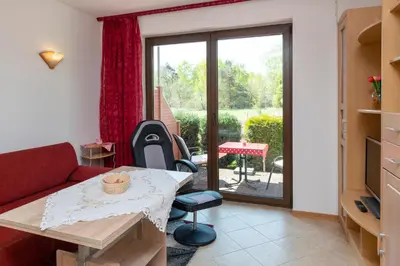 Ein Sitzbereich in der Unterkunft Haus Ahrens Wohnung 2