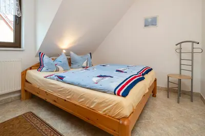 Ein Bett oder Betten in einem Zimmer der Unterkunft Haus Ahrens Wohnung 4