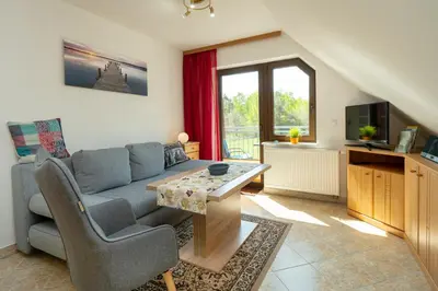 TV/Unterhaltungsangebot in der Unterkunft Haus Ahrens Wohnung 4