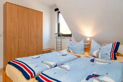 Ein Bett oder Betten in einem Zimmer der Unterkunft Haus Ahrens Wohnung 4