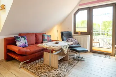 Ein Sitzbereich in der Unterkunft Haus Ahrens Wohnung 5