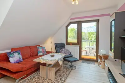 Ein Sitzbereich in der Unterkunft Haus Ahrens Wohnung 5