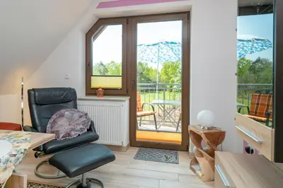 Ein Sitzbereich in der Unterkunft Haus Ahrens Wohnung 5