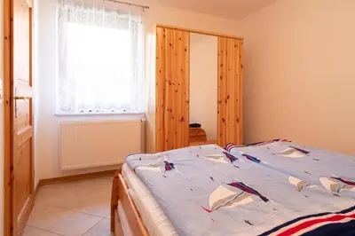Ein Bett oder Betten in einem Zimmer der Unterkunft Haus Ahrens Wohnung 3
