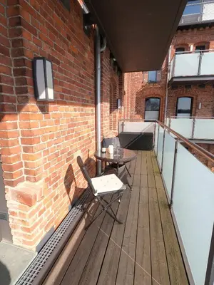 Ein Balkon oder eine Terrasse in der Unterkunft Barther Hafensonne