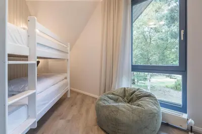 Ein Bett oder Betten in einem Zimmer der Unterkunft Haus am Meer Kiek Över 6