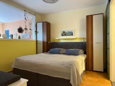 Ein Bett oder Betten in einem Zimmer der Unterkunft Birkenstraße 11a Wohnung 2 - Lütte Uttied