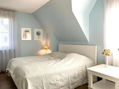 Ein Bett oder Betten in einem Zimmer der Unterkunft Kavelweg 8 - Utspann