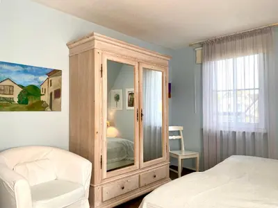 Ein Bett oder Betten in einem Zimmer der Unterkunft Kavelweg 8 - Utspann
