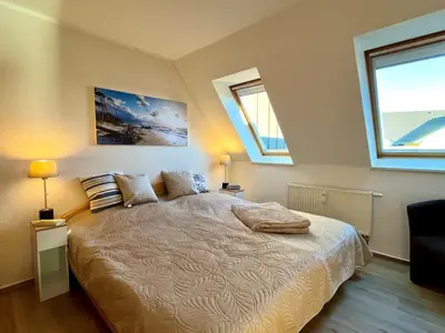 Ein Bett oder Betten in einem Zimmer der Unterkunft Käpt´n Paul