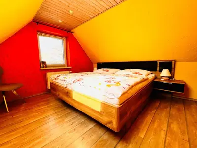 Ein Bett oder Betten in einem Zimmer der Unterkunft Sonnenblume - Sonne 2 rechts