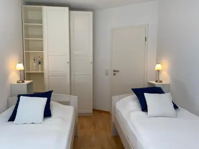 Ein Bett oder Betten in einem Zimmer der Unterkunft Wiesenstraße 21a Haus Zum Kranich