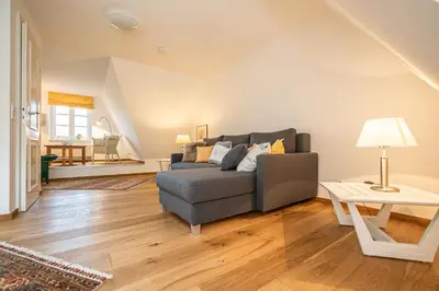 Ein Sitzbereich in der Unterkunft Achtern Diek Haus 2b