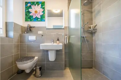 Ein Badezimmer in der Unterkunft Gänseweg 5a Haus Backbordhus