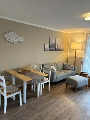 Ein Sitzbereich in der Unterkunft Achtern Diek Haus 3b Wohnung 3