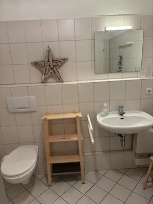 Ein Badezimmer in der Unterkunft Achtern Diek Haus 3b Wohnung 3