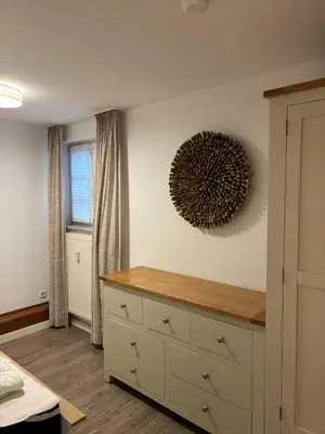 Ein Bett oder Betten in einem Zimmer der Unterkunft Achtern Diek Haus 3b Wohnung 3