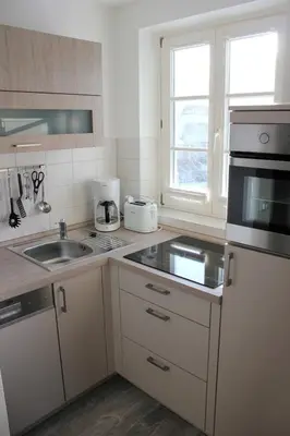 Küche/Küchenzeile in der Unterkunft Achtern Diek Haus 3a Wohnung 5
