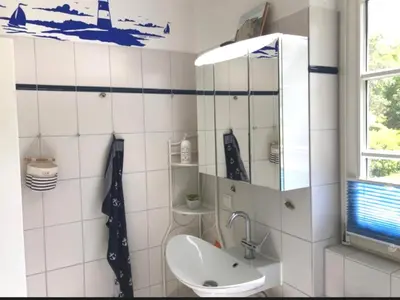 Ein Badezimmer in der Unterkunft Achtern Diek Haus 6 Wohnung 1