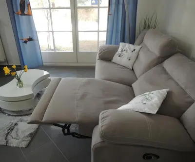 Ein Sitzbereich in der Unterkunft Achtern Diek Haus 6 Wohnung 1