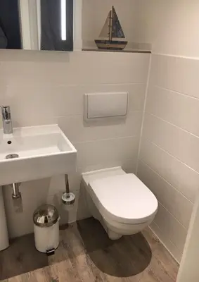 Ein Badezimmer in der Unterkunft Achtern Diek Haus 6 Wohnung 2