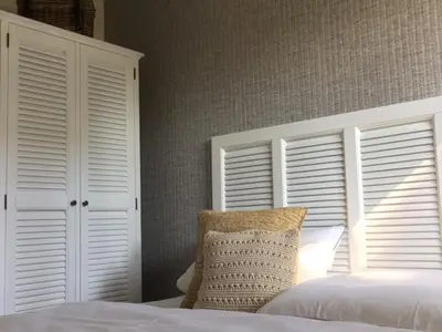 Ein Bett oder Betten in einem Zimmer der Unterkunft Achtern Diek Haus 6 Wohnung 2