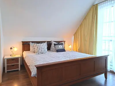 Ein Bett oder Betten in einem Zimmer der Unterkunft Fischmarkt 1 Wohnung 3