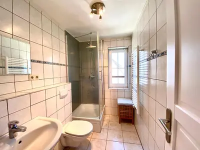 Ein Badezimmer in der Unterkunft Hägerende 66a Haus Ankerplatz Wohnung Peildeck