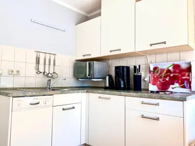 Küche/Küchenzeile in der Unterkunft Hägerende 66a Haus Ankerplatz Wohnung Peildeck