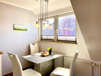 Ein Sitzbereich in der Unterkunft Hägerende 66 Haus Windrose Wohnung Südwind