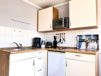 Küche/Küchenzeile in der Unterkunft Hägerende 66 Haus Windrose Wohnung Südwind