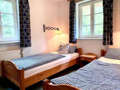 Ein Bett oder Betten in einem Zimmer der Unterkunft Achtern Diek Haus 8 Wohnung 3