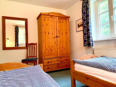 Ein Bett oder Betten in einem Zimmer der Unterkunft Achtern Diek Haus 8 Wohnung 3