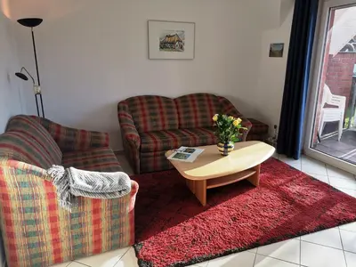 Ein Sitzbereich in der Unterkunft Wohnung Darßer Weg 10b