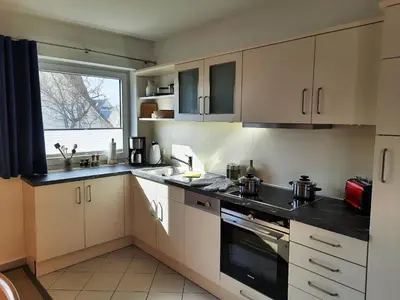 Küche/Küchenzeile in der Unterkunft Wohnung Darßer Weg 10b