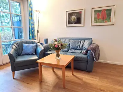 Ein Sitzbereich in der Unterkunft Achtern Diek Haus 7 Wohnung 3