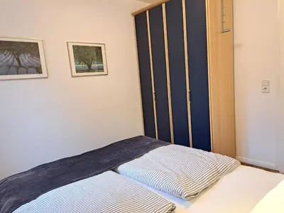 Ein Bett oder Betten in einem Zimmer der Unterkunft Achtern Diek Haus 7 Wohnung 3